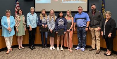 City Council members in chambers with Wilsonville HS golf team