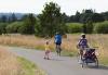 family biking in Graham Oaks Park