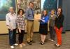 Kerry Rappold (third from left) receives his award for stewardship of City's natural resources in Council chambers.